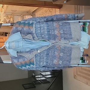 Sweater multi colored with snap buttons super soft and comfy.